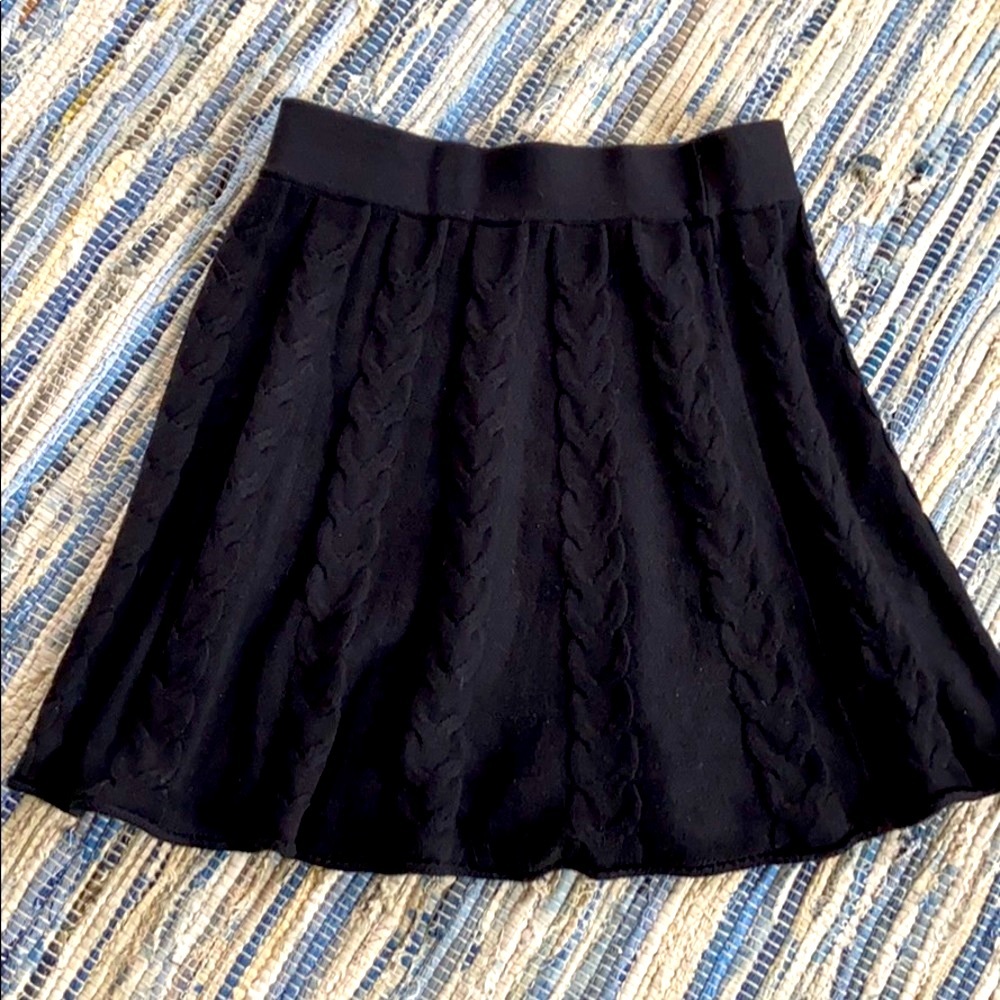 Women’s Akini black sweater swing mini skirt